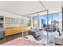 Open living area featuring modern decor, city views, and sleek finishes at 3722 Las Vegas Blvd # 2204, Las Vegas, NV 89158