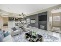 Bright living room featuring plush seating, fireplace, and seamless flow into the dining area at 6701 Dorita Ave # 202, Las Vegas, NV 89108