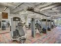 Bright fitness center with modern exercise machines and patterned floors at 8255 Las Vegas Blvd # 611, Las Vegas, NV 89123