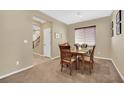 Cozy dining area featuring carpet, neutral walls, and natural light at , Las Vegas, NV 89131