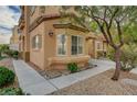 Close up view of a charming home featuring desert landscaping and a charming bay window at 11159 African Sunset St, Henderson, NV 89052
