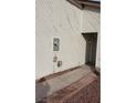 View down the side of the exterior showing walkway to front door and side of home at 2021 San Simeon St, Las Vegas, NV 89108