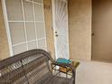 Charming apartment entrance featuring a cozy bench, stylish security door, and an inviting welcome mat at 3455 Erva St # 219, Las Vegas, NV 89117