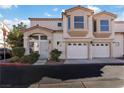 Multi-level townhouse with a two-car garage and well-maintained landscaping in a modern neighborhood at 4012 Cape Sand Dr, Las Vegas, NV 89108