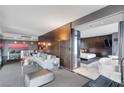 Open-concept living area flowing into bedroom and bath, featuring modern design at 4381 West Flamingo Rd # 8322, Las Vegas, NV 89103