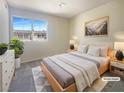 Serene bedroom featuring a comfortable bed, ample natural light, and stylish decor, providing a relaxing retreat at 5383 Mountain Vista St # 20, Las Vegas, NV 89120