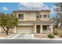 Beautiful home with a well-manicured front yard, a two car garage and a tile roof at 9432 Victory Garden Ave, Las Vegas, NV 89149