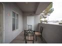 Condo covered patio featuring a table and chairs; perfect for enjoying the outdoors at 1704 N Jones Blvd, Las Vegas, NV 89108