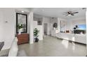 Bright and airy living room with neutral tones, stylish decor, and seamless flow into other living spaces at 3009 Chilly Nights Ave, North Las Vegas, NV 89031