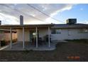 Enjoy outdoor dining with this covered patio and barbecue area at 301 Falcon Ln, Las Vegas, NV 89107