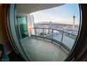 Spacious outdoor balcony boasting beautiful city views and a sleek glass railing at 322 Karen Ave # 3407, Las Vegas, NV 89109