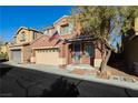 Charming two-story home featuring a spacious two-car garage and well-maintained front yard at 7214 Regent Pond St, Las Vegas, NV 89166