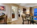 Inviting living space with a glimpse of a well-appointed bathroom and cozy bedroom at 125 E Harmon Ave # 3406 & 3408, Las Vegas, NV 89109