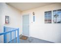 Front door entrance featuring a secure screen door, overhead light and adjacent window for bright, welcoming entry at 2725 S Nellis Blvd # 2045, Las Vegas, NV 89121