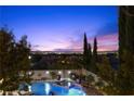 Backyard pool and spa featuring inset tile design; city views at 320 Lorelei Rock St, Las Vegas, NV 89138