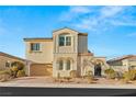 Charming home featuring a two-car garage, welcoming courtyard, and manicured landscaping at 352 Dandelion Brook Ct, Las Vegas, NV 89148