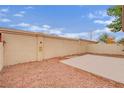 A cozy backyard with a gravel yard and cement patio at 2218 Ramsgate Dr # 0, Henderson, NV 89074