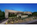 Stunning modern home with drought-tolerant landscaping and gravel ground cover at 2630 Juniper Branch St, Las Vegas, NV 89117