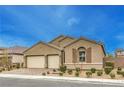 Charming single-story home featuring a two-car garage and desert landscaping at 8841 White Harbor Ave, Las Vegas, NV 89148