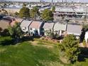 Aerial view of townhomes on a well-maintained green property, showcasing a vibrant community at 914 Tam O Shanter, Las Vegas, NV 89109