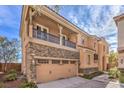 Charming two-story house with stone accents and a two-car garage at 11178 Corsica Mist Ave, Las Vegas, NV 89135