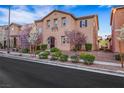 Charming two-story home showcasing colorful landscaping and a well-maintained exterior at 3189 Sisley Garden Ave, Henderson, NV 89044