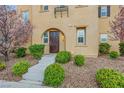 Charming two-story home featuring a well-maintained front yard and landscaping at 3189 Sisley Garden Ave, Henderson, NV 89044