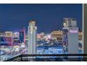 Expansive Las Vegas skyline showcasing 'Palms' towers and vibrant city lights at night at 4381 W Flamingo Rd # 3002, Las Vegas, NV 89103