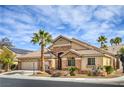 Well-manicured single-story home featuring desert landscaping, a tile roof, and a spacious three-car garage at 1532 Via Cassia, Henderson, NV 89052