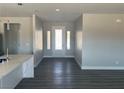 The entryway is complemented by the open-concept floor plan, modern lighting, and luxury vinyl flooring at 2530 S Tecumseh Ave, Pahrump, NV 89048