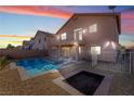 Inviting backyard pool with lounge chairs, fenced perimeter, and low-maintenance landscaping offers a relaxing outdoor space at 304 Jolly January Ave, Las Vegas, NV 89183