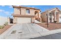 Charming home with an attached garage and a well-manicured front yard, providing excellent curb appeal at 304 Jolly January Ave, Las Vegas, NV 89183
