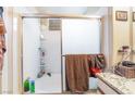 Cozy bathroom features a shower-tub combination with white tiles at 4960 Harrison Dr # 131, Las Vegas, NV 89120
