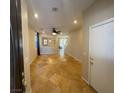 Open concept living space featuring tile floors, ceiling fan, recessed lighting, and abundant natural light at 5361 Candlespice Way, Las Vegas, NV 89135