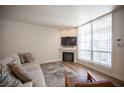 Beautifully decorated living room with a modern fireplace at 6704 Dorita Ave # 101, Las Vegas, NV 89108