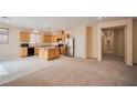 Open floorplan with kitchen open to a large living space at 7317 Caballo Range Ave, Las Vegas, NV 89179