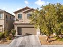 Charming two-story home with stucco siding, a well-maintained front yard, and a two-car garage at 8248 Southern Cross Ave, Las Vegas, NV 89131