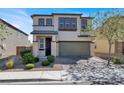 Charming two-story home with a well-maintained lawn and a two-car garage at 8639 Tortoise Canyon Ct, Las Vegas, NV 89148