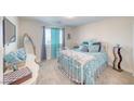 Cozy bedroom with natural light, decorated with light blue accents and comfortable furnishings at 3050 Oakridge Ave, Pahrump, NV 89048