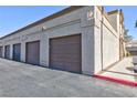 A row of private garages provides secure parking and additional storage at 3660 Renovah St # 201, Las Vegas, NV 89129