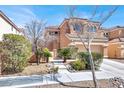 Beautiful home featuring manicured landscaping, rock accents, and a charming walkway to the entrance at 7156 N Campbell Rd, Las Vegas, NV 89149