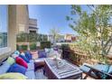Inviting balcony with comfortable seating, perfect for relaxing and enjoying the outdoor view at 7609 Trimming Ct, Las Vegas, NV 89149