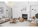 Inviting living room with fireplace, stylish furniture, and ample seating at 1624 N Torrey Pines Dr # 101, Las Vegas, NV 89108