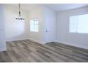 Bright living room with luxury vinyl plank flooring at 1624 N Torrey Pines Dr # 101, Las Vegas, NV 89108
