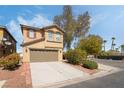 Attractive exterior view showcases landscaping and a convenient two-car garage at 4650 Chino Peak Ct, Las Vegas, NV 89139