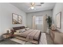 Modern bedroom with plush carpet, ambient lighting, and stylish decor and furniture at 4730 E Craig Rd # 1093, Las Vegas, NV 89115