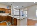 Beautiful kitchen with granite countertops, stainless steel appliances, and wood cabinets at 9816 Gerald Ct, Las Vegas, NV 89134