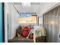 Image shows an exterior balcony with some personal belongings at 1455 E Katie Ave # A21, Las Vegas, NV 89119