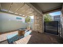 Inviting outdoor patio with brick flooring, pergola, and a cozy fire pit at 2514 Spergola St, Henderson, NV 89044