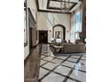 Spacious lobby with marble floors, high ceilings, and comfortable seating at 2747 Paradise Rd # 1706, Las Vegas, NV 89109
